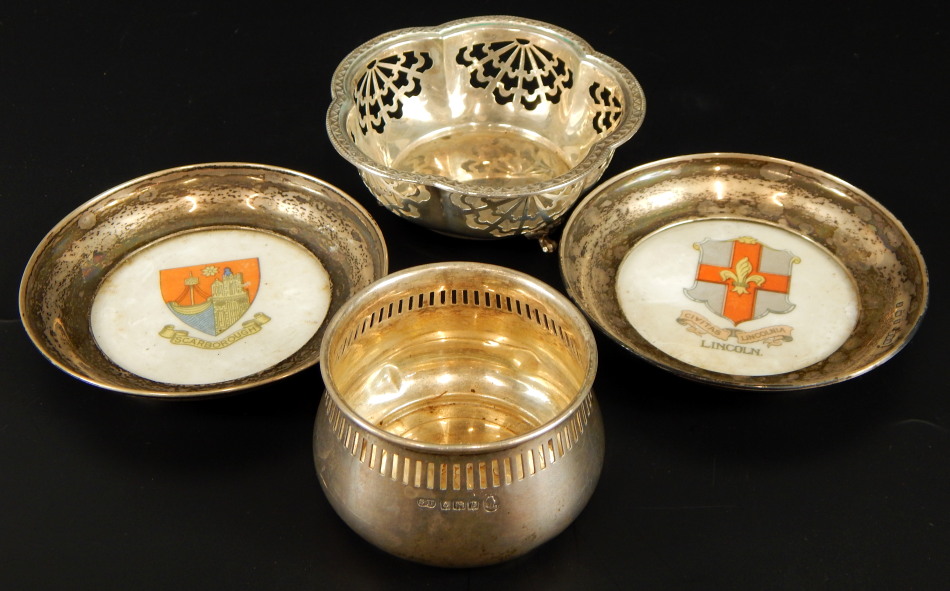 Four silver trinket items, comprising two crested ware pin dishes for Lincoln & Scarborough with