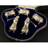 A George VI matched silver cruet set, with fluted design and shell spoons, various assays and dates,