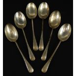 A set of six Edwardian silver fiddle pattern teaspoons, with thread floral design, Chester 1902, 1¾