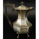 A George V silver coffee pot, of canted form, with ebonised handle and knop, Sheffield 1917, 18½oz