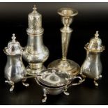 Various small items of silver and silver plate, comprising a silver tapering candlestick, with