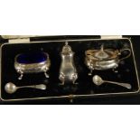 A George V matched silver cruet set, retailed by Barnes & Son, Gainsborough, Birmingham 1926, in a