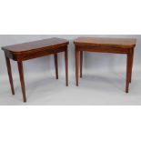 A pair of early 19thC mahogany tea tables, the D-shaped top with a crossbanded and boxwood strung