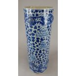 A late 19thC Chinese blue and white cylindrical porcelain umbrella stand, decorated overall with a