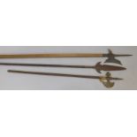 Three replica pikes or lances, each with iron tip and wooden shaft