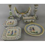 Three items of French faience, to include a centrepiece decorated with the crest Amavie Cancale, two