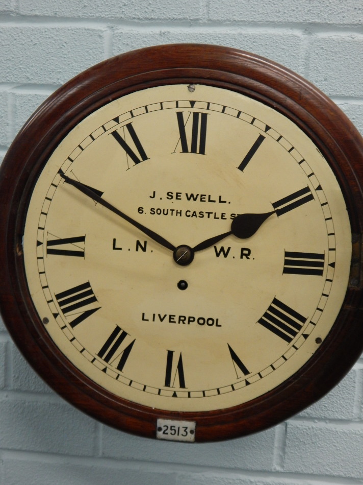 A late 19th/early 20thC mahogany railway wall clock, the white enamel dial painted J Sewell, 6 South - Bild 2 aus 3