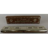 A large F.A. Rouner Diana tremolo harmonica, in original box. (M)