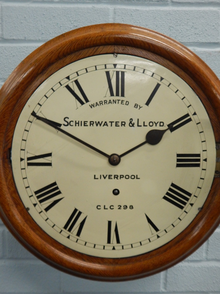 A late 19th/early 20thC oak railway wall clock, the white dial bearing inscription 'warranted by - Bild 2 aus 3