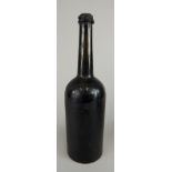 A bottle of wine or spirit, possibly port, the bottle stamped Wynand Focking Amsterdam (M)