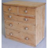 A 19thC pine chest of drawers, the top with a moulded edge above two short and three long drawers,