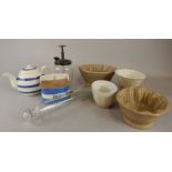 Miscellaneous kitchenalia, to include a glass Conware rolling pin, Cornishware saltbox, jelly moulds