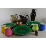 A collection of 19thC and later ceramics, to include a Doulton stoneware mug, two majolica lily