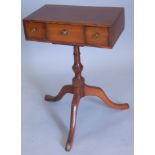 An oak occasional table, the top with three drawers, on a turned column and tripod base, the top