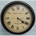 A late 19thC ebonised railway wall clock, the white dial signed Arnold & Lewis, Manchester, 521 L.