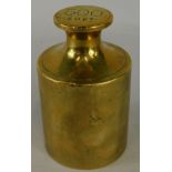 A large brass weight, stamped to top 500 sovs, presumably the weight of five hundred sovereigns,