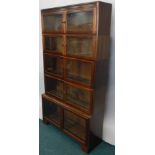 An early 20thC four section mahogany Globe Wernicke type bookcase, with two pairs of glazed doors,