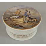 A Prattware pot lid, printed with a scene titled The Sportsman, the base printed Silk Shave Soap