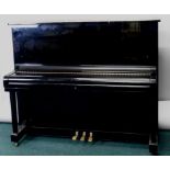 An Apollo ebonised upright piano, made by Toyo Piano numbered 82204,153cm wide