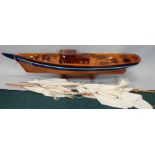 A scale model of a two masted sailing ship, La Belle Poule, part painted in navy, 151cm long