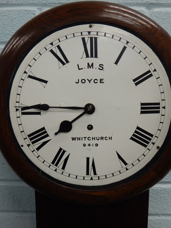 A late 19thC oak and pine railway drop dial wall clock, the white dial painted for L.M.S. by Joyce - Bild 2 aus 4