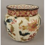 A small Zslonay Pecs jardiniere or bowl, decorated in Islamic style with flowers etc., within a