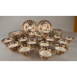 A quantity of Royal Crown Derby Imari porcelain, decorated with the 1128 pattern, to include side
