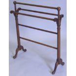 A Victorian mahogany towel rail, of turned form on four splayed legs, 73cm wide