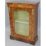 A Victorian walnut and marquetry pier cabinet, with a shaped cornice with tulipwood crossbanded