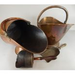 Two copper coal buckets, each with a swivel handle, one with a shovel (M)