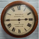 A late 19thC mahogany railway wall clock, the dial bearing the initials M & G.N.JT, Weybourne Box,