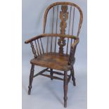 A beech, ash and elm Windsor chair, with a pierced splat, solid seat on turned legs (AF) (M)