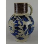 A German Westerwald type stoneware jug, possibly 18thC, decorated with the cipher of King George,