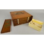 An early 20thC Mahjong set, various bone counters etc. (M)