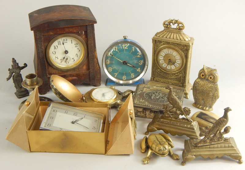 A collection of items, to include a mantel clock in a stained pine case, pieces of brass, a horn