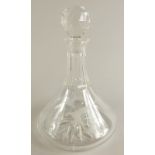 A ship's type cut glass decanter and stopper, with etched decoration of ducks in flight, 28cm high.