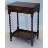 An Old English pattern part canteen of cutlery, in oak table case with spirally turned supports,