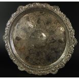 A late Victorian silver salver, with shell leaf cast pierced border, engraved centrally with