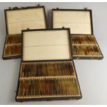 Various early 20thC microscope specimen slides, contained in three cases 28cm wide. (a quantity)
