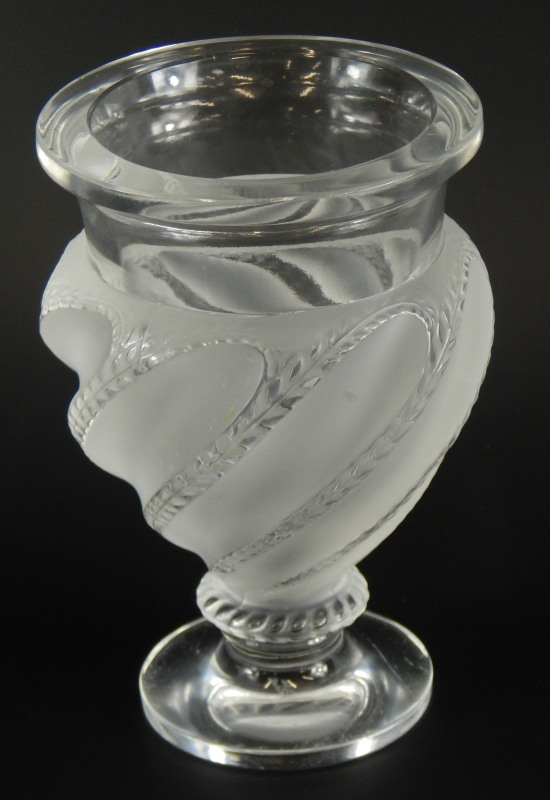 A Lalique glass vase, with wrythen decoration of leaves, etched mark to underside Lalique France,