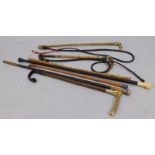 Various walking sticks, whips, etc., to include ivory handled walking cane, one with silver