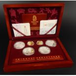 A 2008 Beijing VIP limited edition 10th August 12/99 coin set, comprising two third ounce 22ct 150