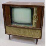 A Bush type E125C valve television, in mahogany case, 74cm wide