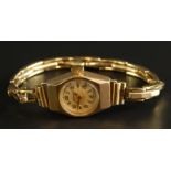 A 9ct gold Renown ladies wristwatch, with circular watch head, on cream dial, with expanding