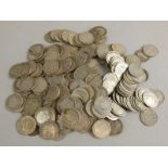 A large quantity of silver threepenny bits.