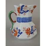 A Mason's Ironstone china octagonal jug, with Imari style decoration and dragon handle, 13cm high.