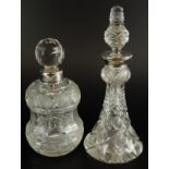 Two similar early 20thC cut glass scent bottles, each with a stopper and a silver collar.
