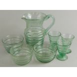 An early to mid 20thC crackle glass dining set, comprising a lemonade jug 19cm high, three glasses