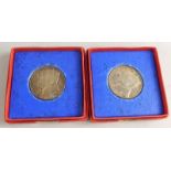 Two George V Jubilee coins, each in original case.