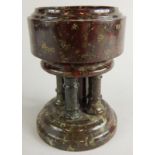 A Victorian turned Cornish serpentine miniature stone travel font, on a domed foot, 15cm high.